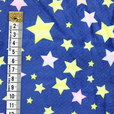 Bubs sherpa fleece printed with stars on blue with a cm ruler