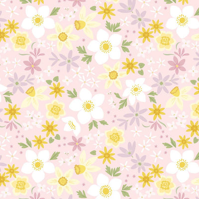 Daffodils printed on a pale pink cotton fabric by Lewis & Irene.