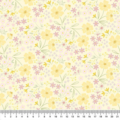 Mini multi flowers in pastel yellow and purple with delicate leaves on a gentle yellow cotton fabric with a cm ruler.