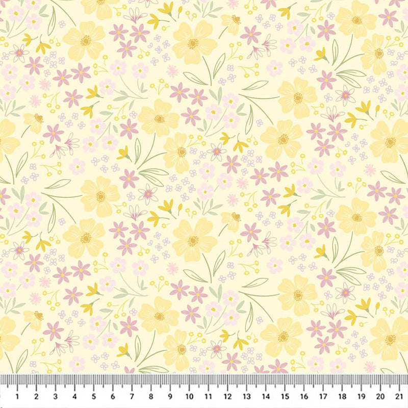 Mini multi flowers in pastel yellow and purple with delicate leaves on a gentle yellow cotton fabric with a cm ruler.