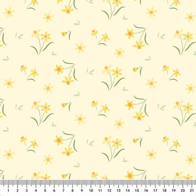 Sunshine yellow daffodils on a pretty pale yellow background printed on cotton fabric with a cm ruler