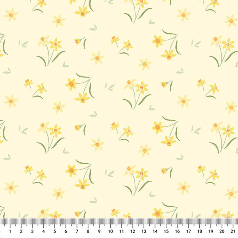 Sunshine yellow daffodils on a pretty pale yellow background printed on cotton fabric with a cm ruler