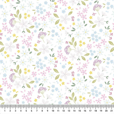 Pressed flowers printed on a white cotton quilting fabric by Lewis & Irene with a cm ruler