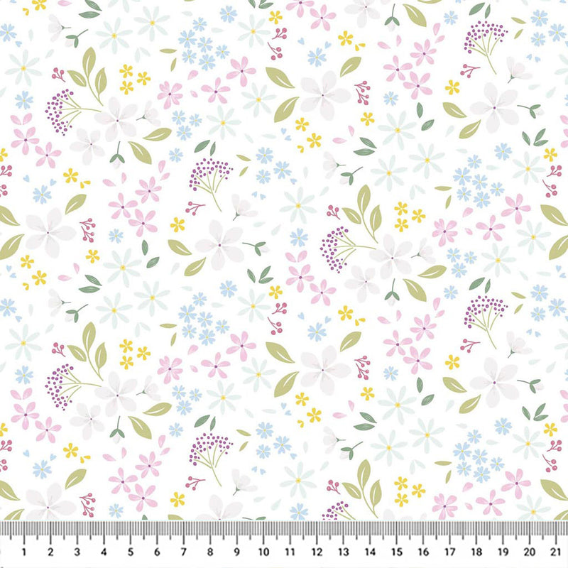 Pressed flowers printed on a white cotton quilting fabric by Lewis & Irene with a cm ruler