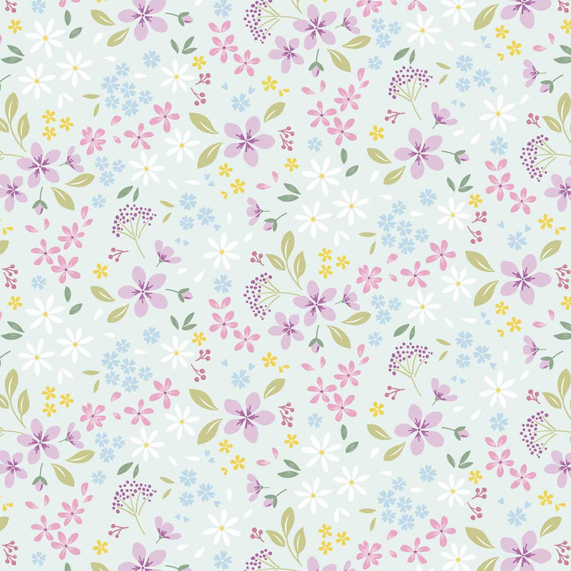 Pressed flowers printed on a light teal cotton quilting fabric