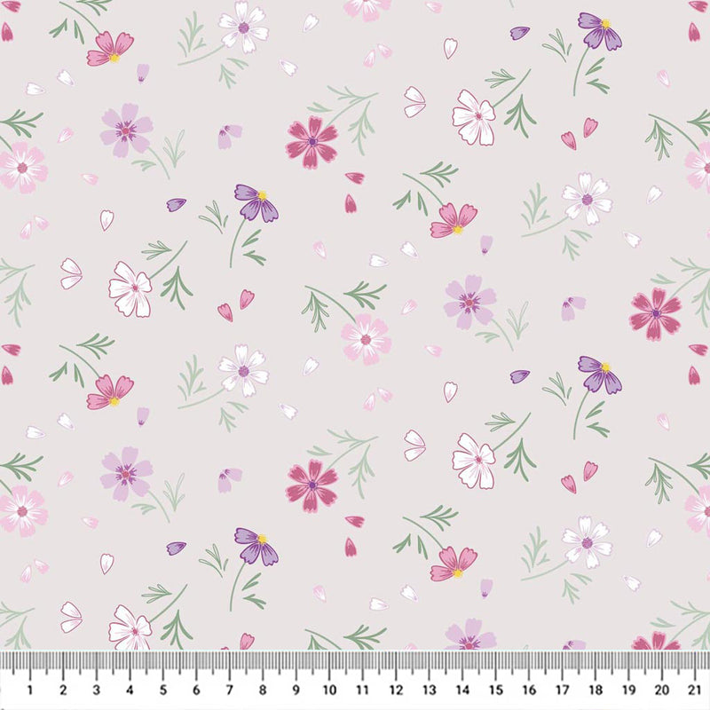 Flowers printed on a silver cotton quilting fabric by Lewis & Irene with a cm ruler