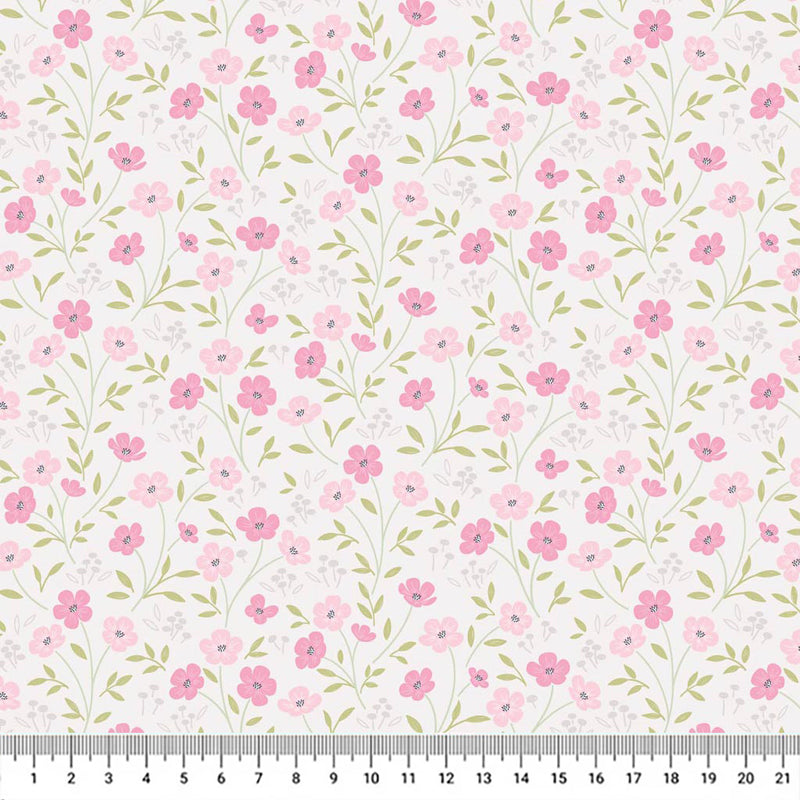 Blossoms printed on a light mink cotton quilting fabric by Lewis & Irene with a cm ruler