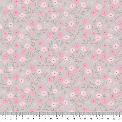 Blossoms printed on a taupe cotton quilting fabric by Lewis & Irene with a cm ruler