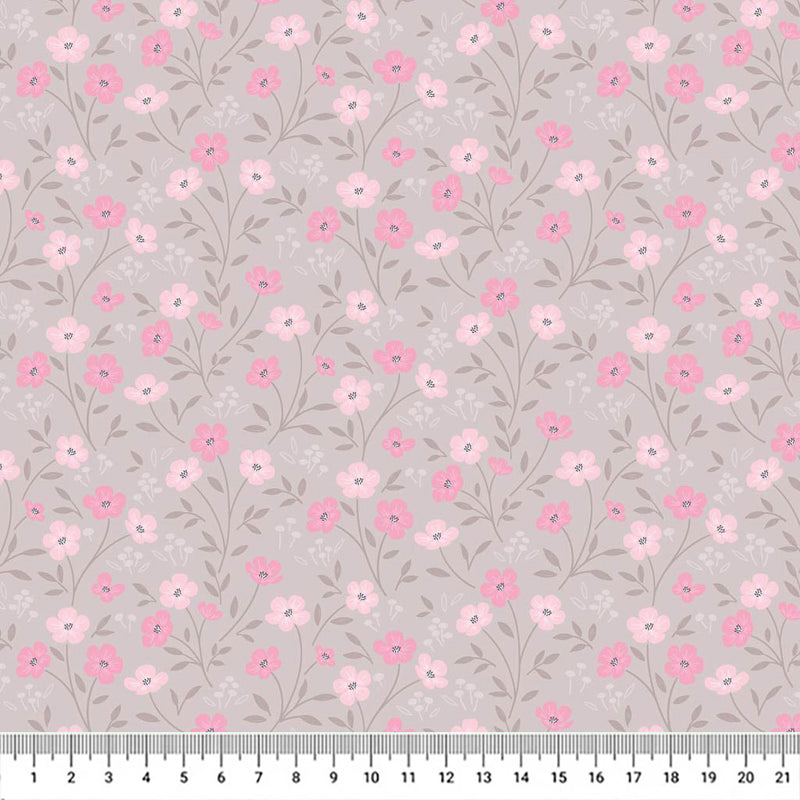 Blossoms printed on a taupe cotton quilting fabric by Lewis & Irene with a cm ruler