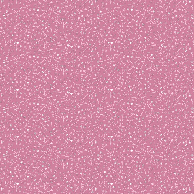 Ditsy flower printed on a cerise cotton quilting fabric by Lewis & Irene