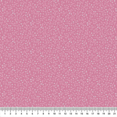 Ditsy flower printed on a cerise cotton quilting fabric by Lewis & Irene with a cm ruler