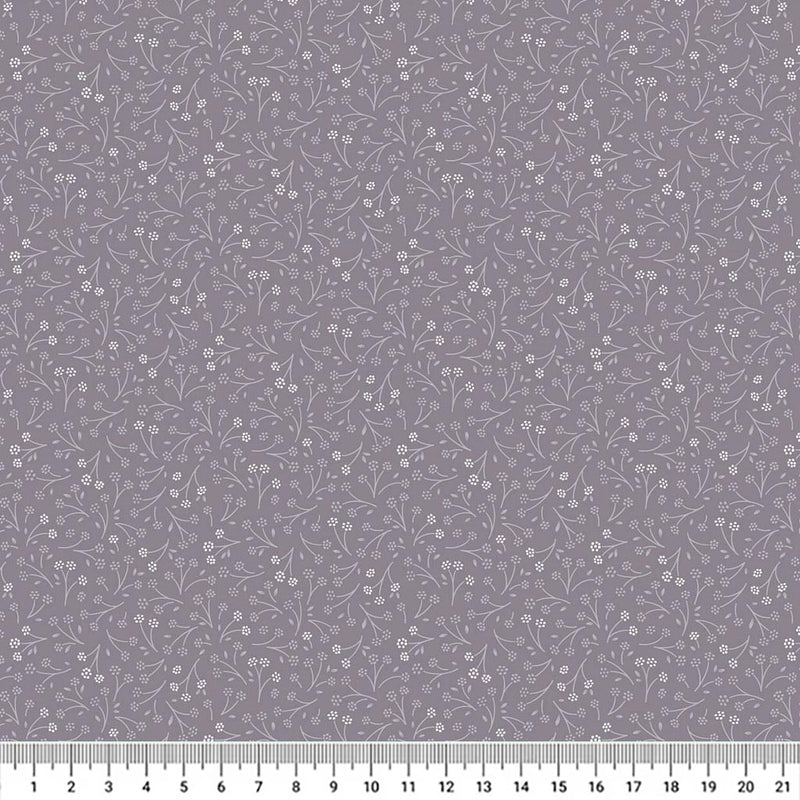 Ditsy flower printed on a charcoal grey cotton quilting fabric by Lewis & Irene with a cm ruler