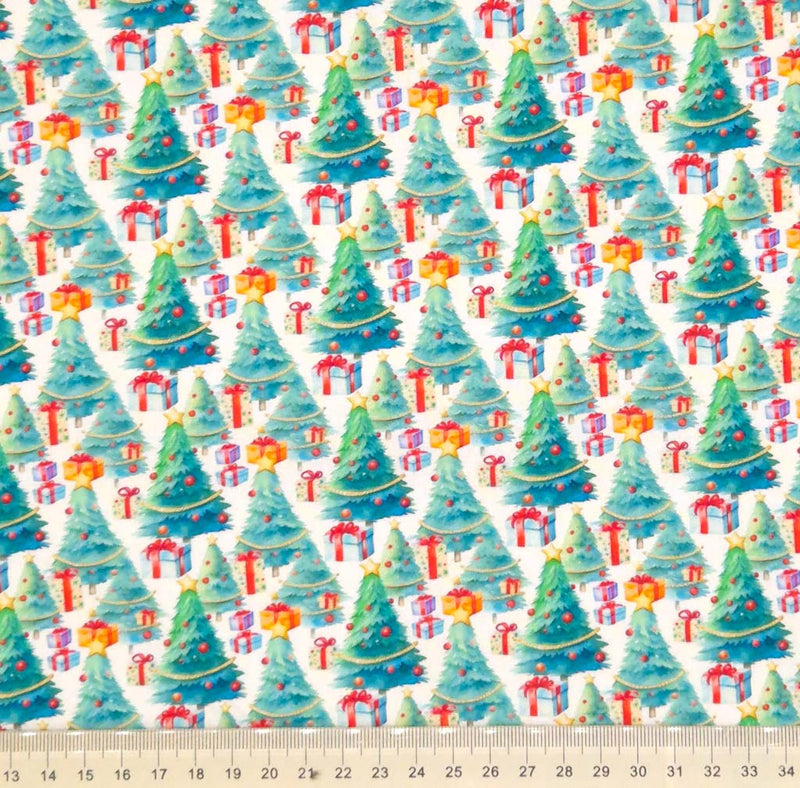 Christmas trees printed on a white cotton fabric by Little Johnny with a cm ruler