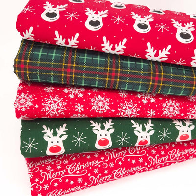 A christmas fat quarter bundle of 5 festive designs with reindeer and green tartan.