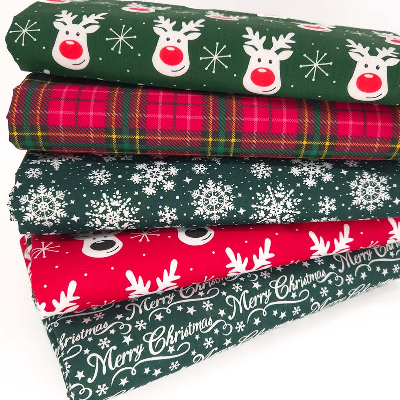 A christmas fat quarter bundle of 5 festive designs with reindeer and red tartan.