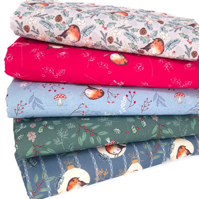 A cotton fat quarter bundle with festive robins in blue, red and green