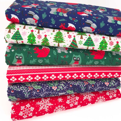 A bundle of six festive polycotton fabrics with woodland animals