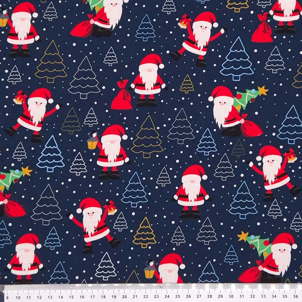 Santa printed on a navy cotton jersey fabric with a cm ruler