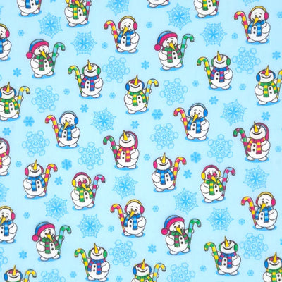 Festive snowmen printed on  blue polycotton fabric