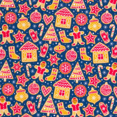 Gingerbread people and houses printed on a navy polycotton fabric