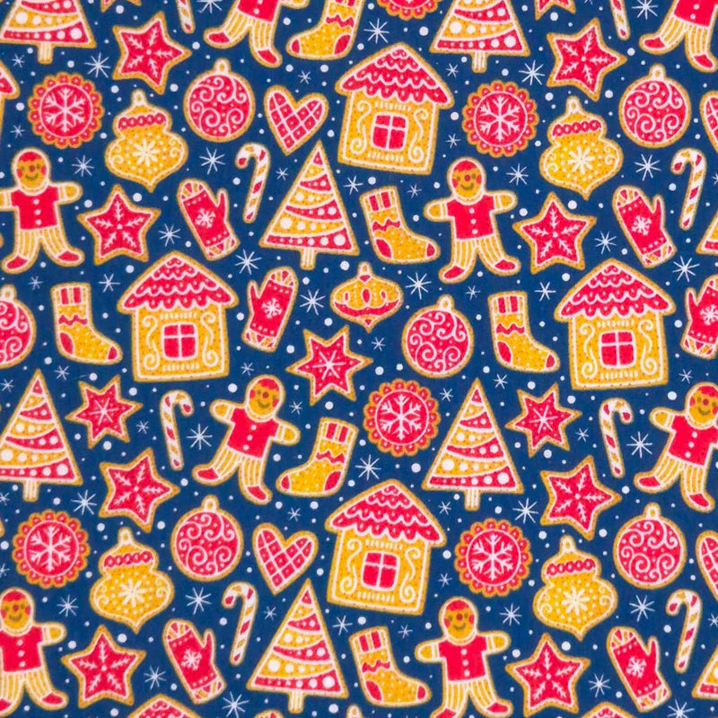 Gingerbread people and houses printed on a navy polycotton fabric