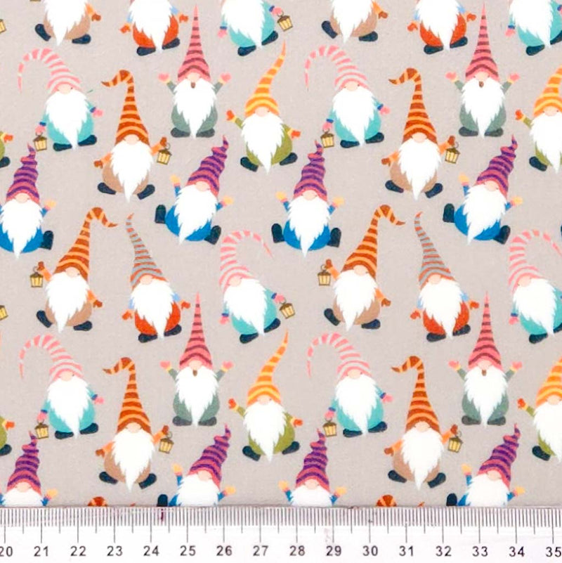 Pattern of colorful gnomes on a beige background with a ruler at the bottom.