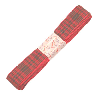 Red plaid ribbon with a white label on a white background