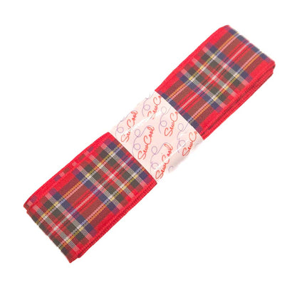 Red tartan fabric ribbon with a white label on a white background