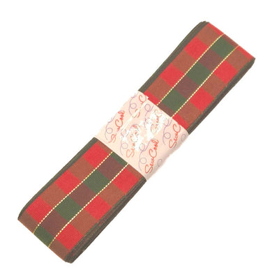 Packaged red and green checkered fabric ribbon on a white background