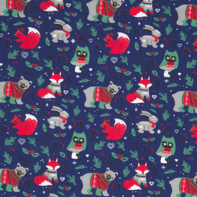 Woodland animals in festive jumpers printed on a navy polycotton fabric