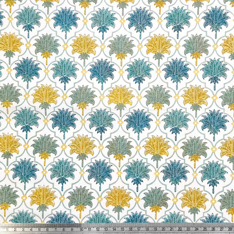 Mosaic style print featuring feather fans in shades of blue, grey and yellow, printed on a contrasting white 100% cotton fabric with a cm ruler