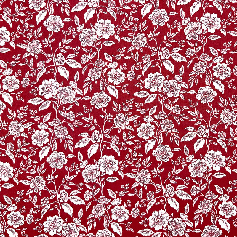 White flowers on a deep wine background; printed on a 100% cotton fabric