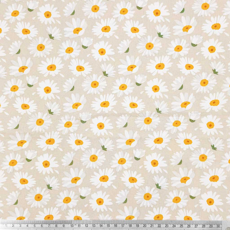 A simple design of falling daisies, printed on a beige 100% cotton fabric with a cm ruler