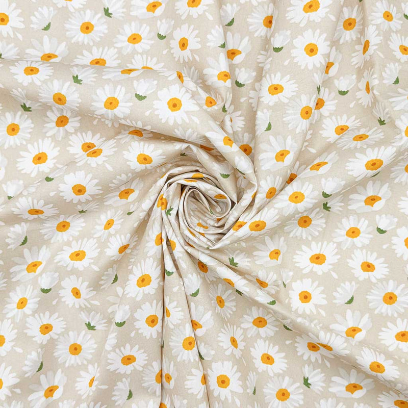 A simple design of falling daisies, printed on a beige 100% cotton fabric