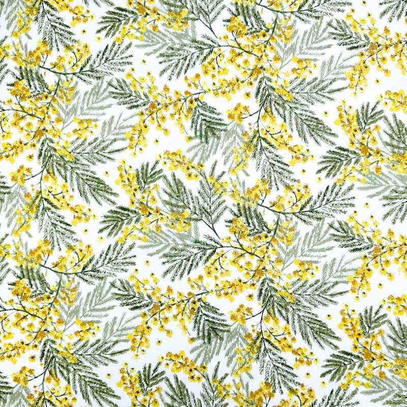 A detailed design of yellow wildflowers and delicate leaves; printed on a 100% cotton fabric