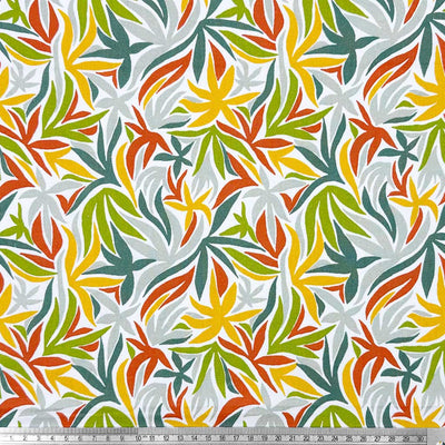 Multicoloured leaves on a contrasting white background; printed on a 100% cotton fabric with a cm ruler