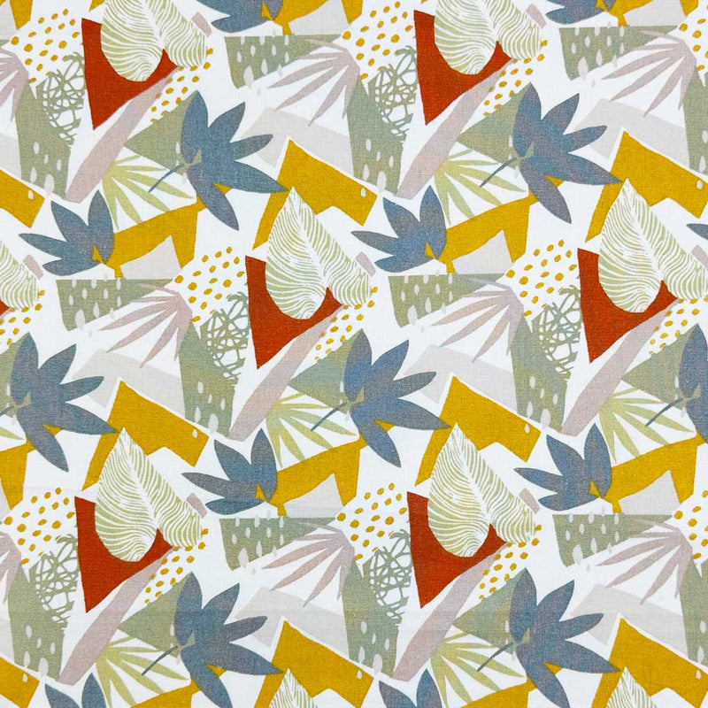 A bright, abstract design of leaves in bold red, blue and yellow on a contrasting background of greys; printed on a 100% cotton fabric