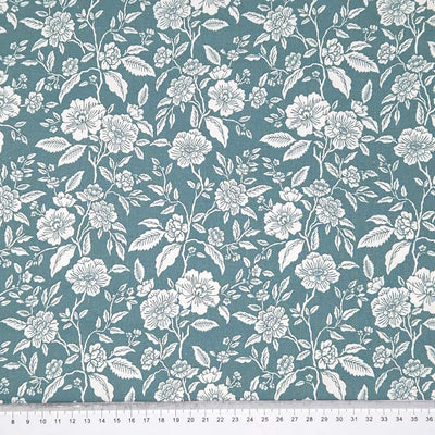 Roses, printed on a rich blue 100% cotton fabric with a cm ruler