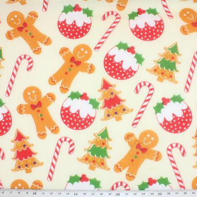 Gingerbread men and candy cane polycotton fabric print