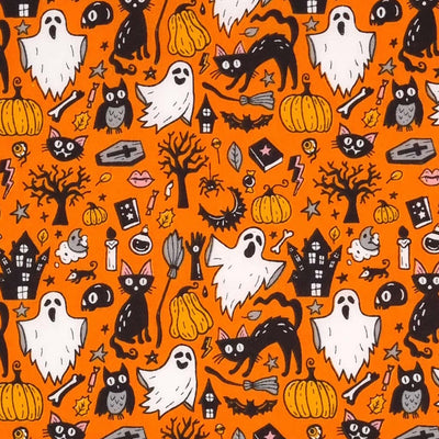Ghosts, cats and pumpkins are printed on an orange halloween polycotton fabric