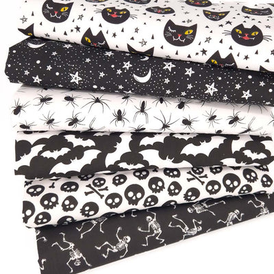 A fat quarter bundle of 6 halloween prints on polycotton fabric