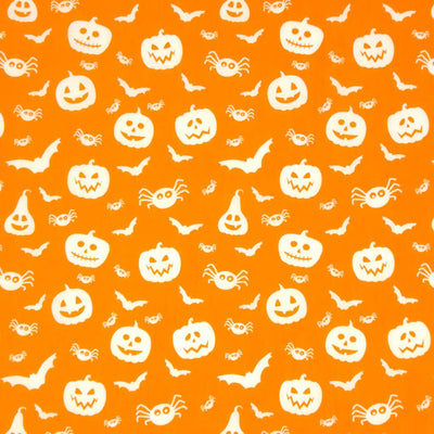 Halloween creatures printed on an orange polycotton fabric