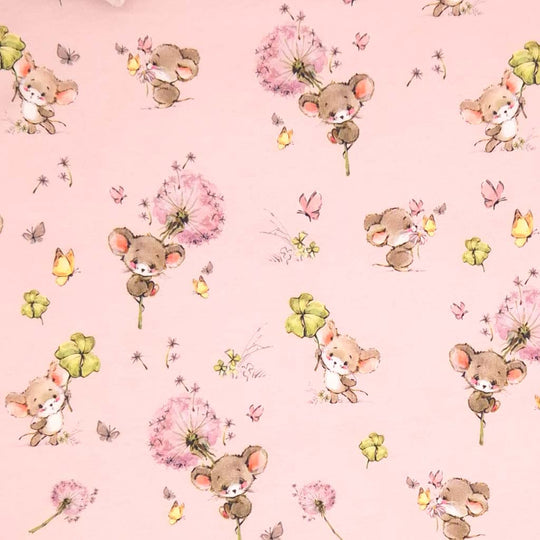 Cute mice holding clover printed on a pink cotton jersey fabric