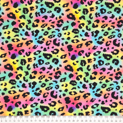 Rainbow leopard printed cotton jersey fabric with a cm ruler