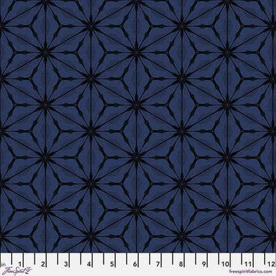 Bloom Noctural hexagonal printed quilting fabric in blues with a cm ruler