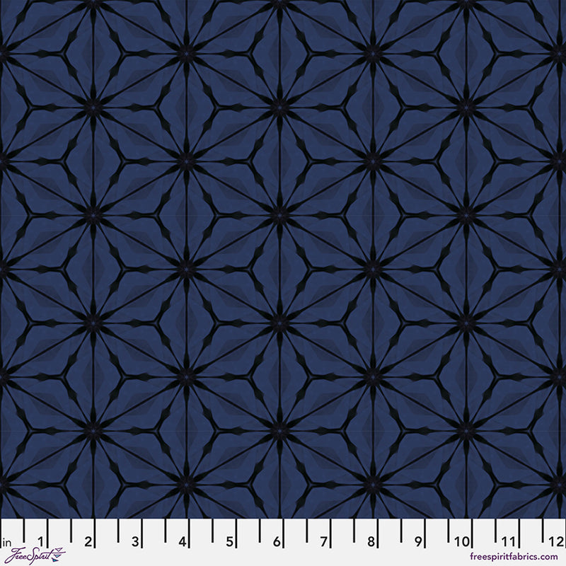 Bloom Noctural hexagonal printed quilting fabric in blues with a cm ruler
