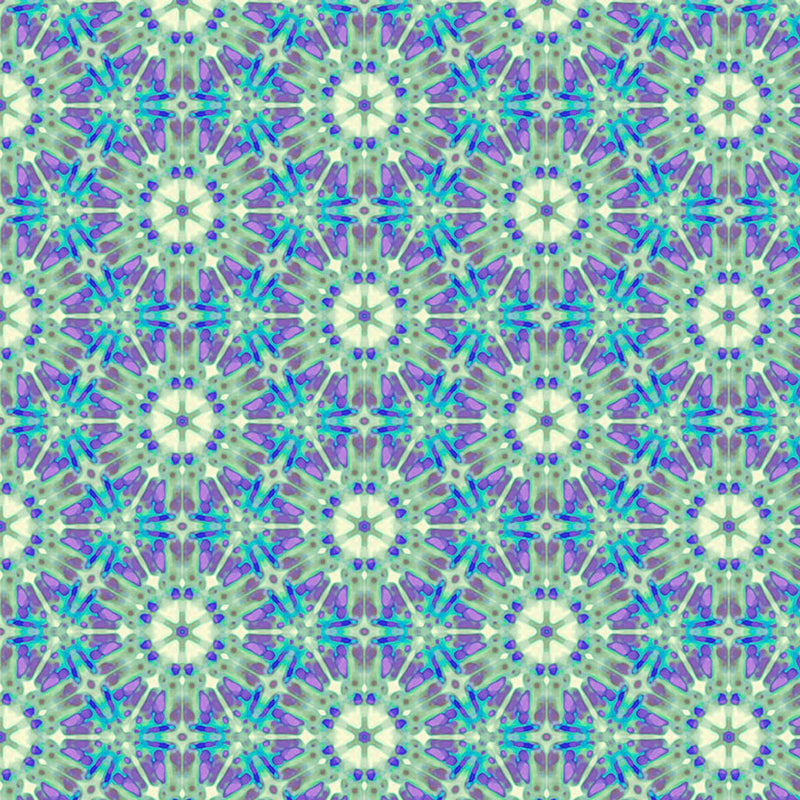 A geometric pattern in purples and greens printed on a cotton quilting fabric