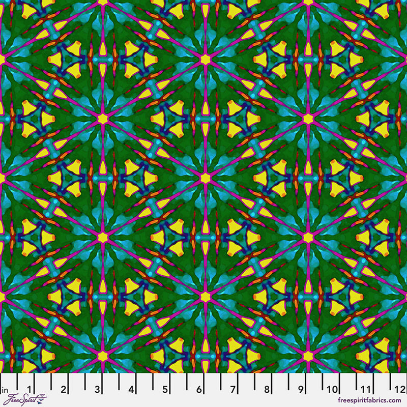 A brightly coloured geometric pattern printed on cotton quilting fabric with a cm ruler