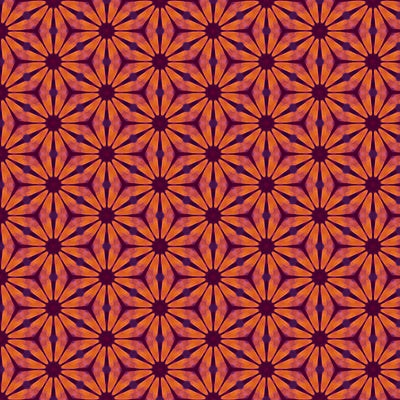 A floral geometric pattern in reds and oranges printed on a cotton quilting fabric