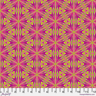 A geometric honeycomb pattern printed on a cotton quilting fabric with a cm ruler